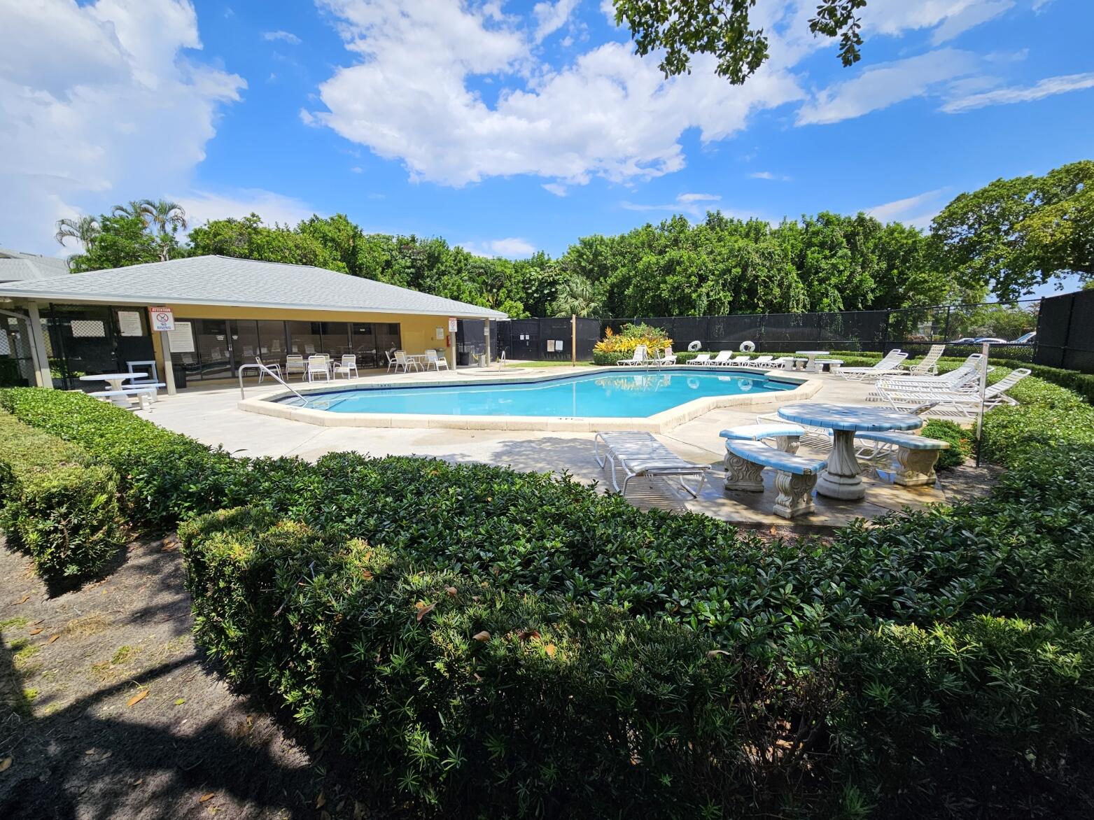 545 Trace Circle, Unit 201 Deerfield Beach, FL 33441 - Photo 33 of 37 TT Pool from Southwest