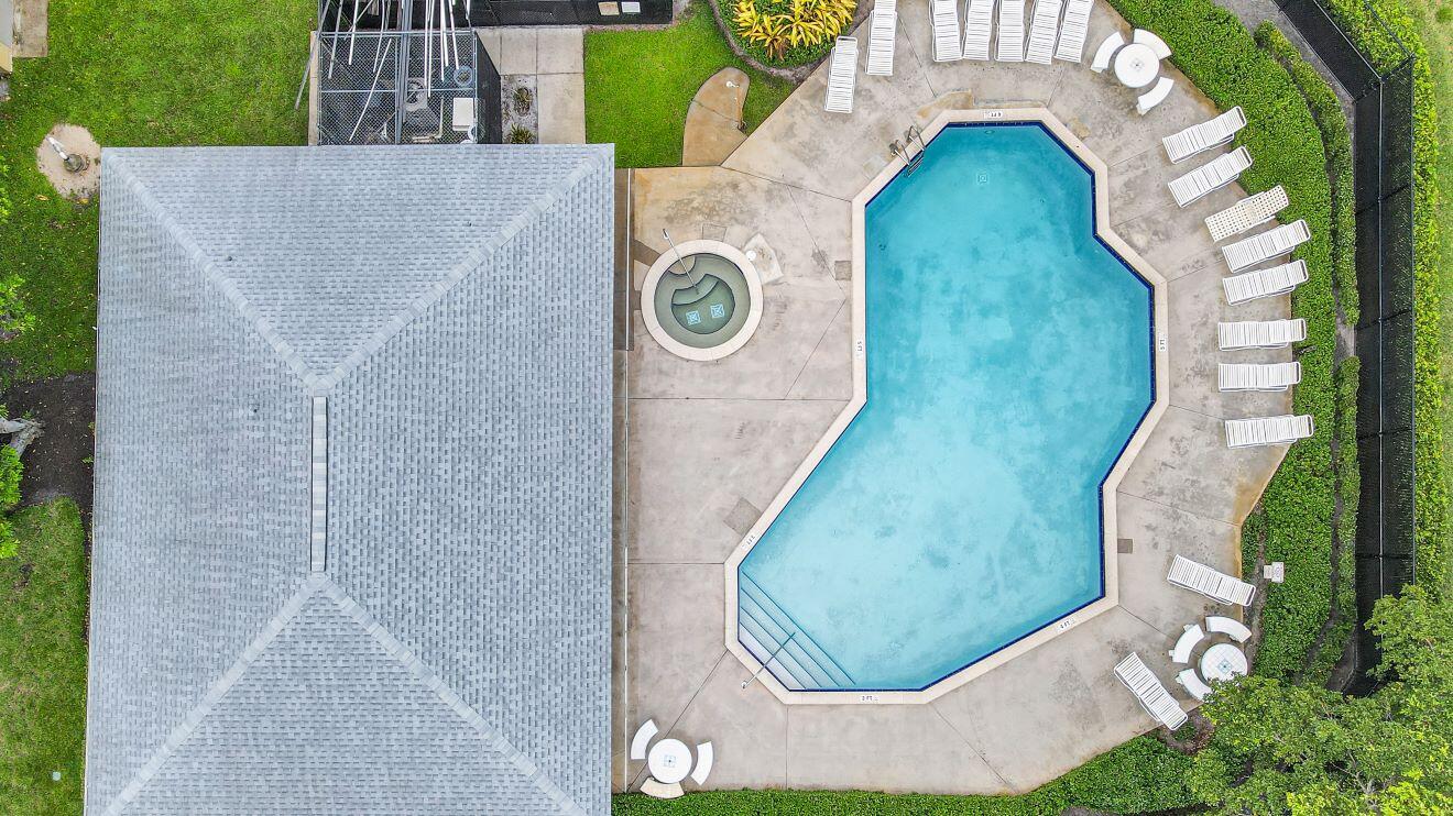 545 Trace Circle, Unit 201 Deerfield Beach, FL 33441 - Photo 34 of 37 Pool and Clubhouse