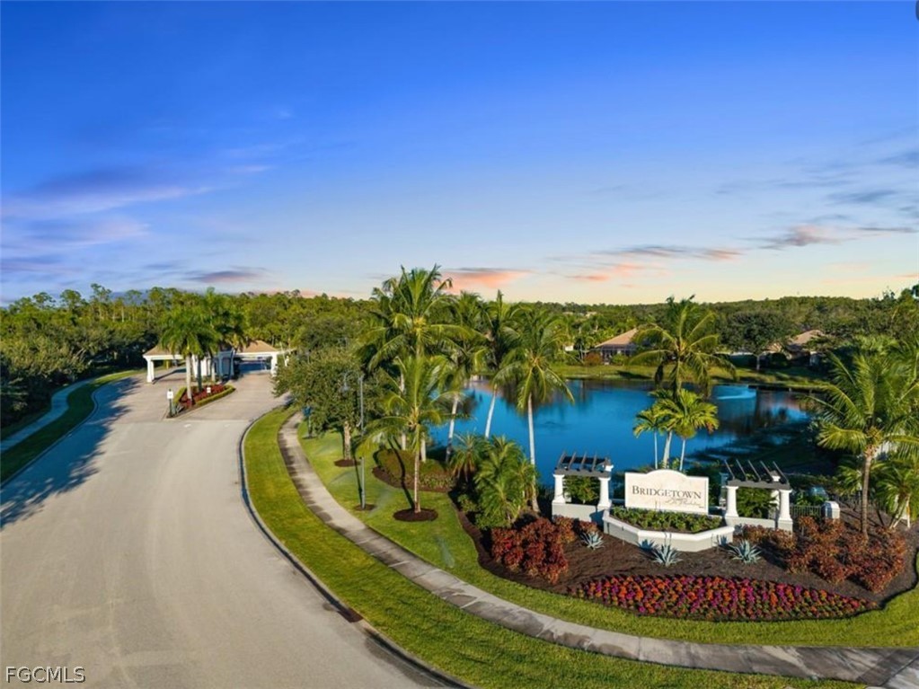 10805 Dennington Road Fort Myers, FL 33913 - Photo 45 of 45 a view of a swimming pool with a yard