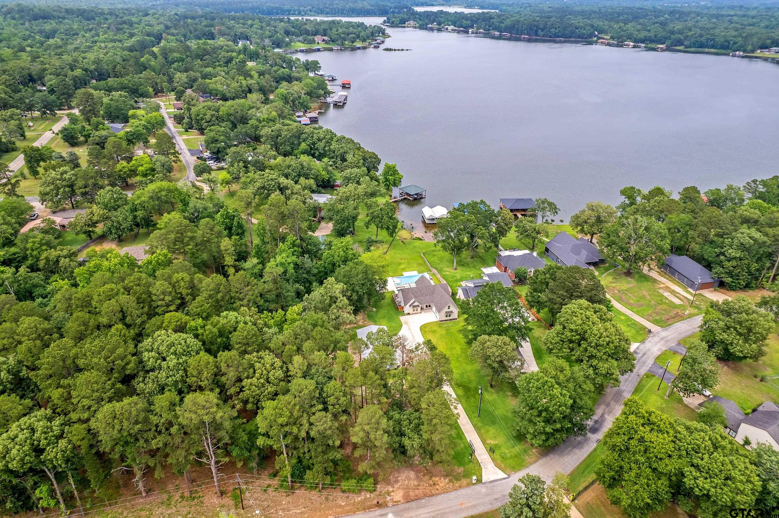 16837 Wilson Road Tyler, TX 75707 - Photo 2 of 44 an aerial view of a house with a yard and garden