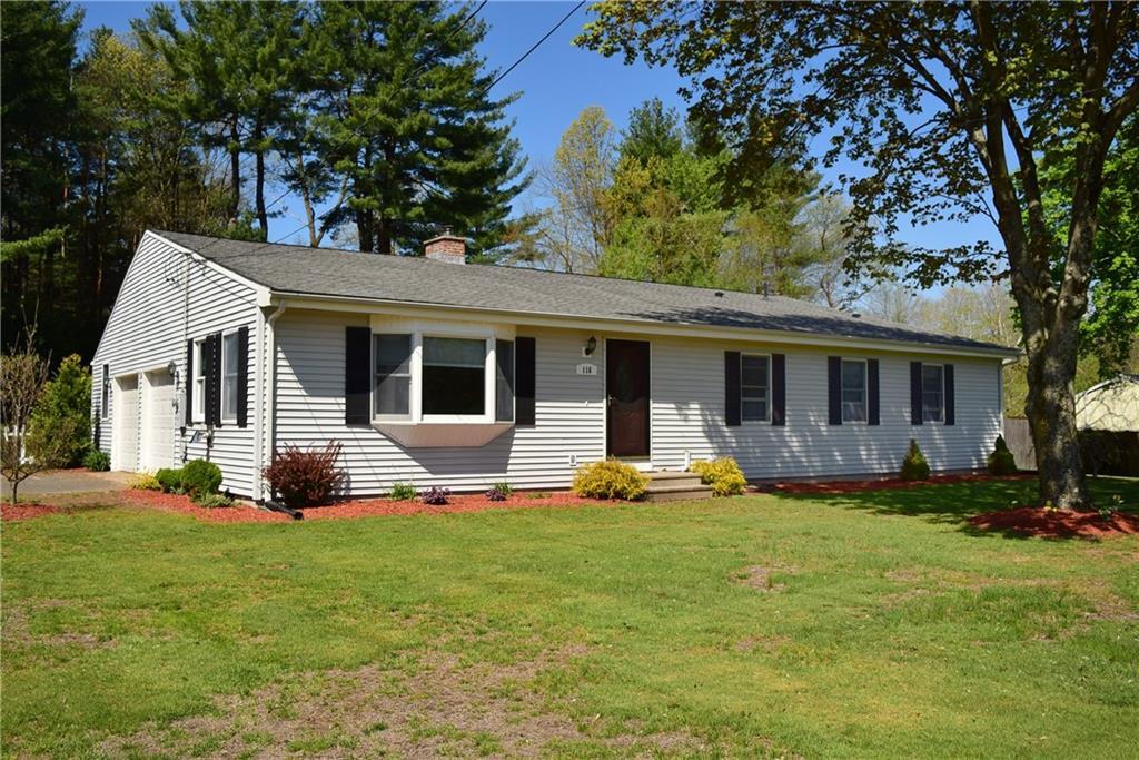 a front view of house with yard outdoor seating and barbeque oven