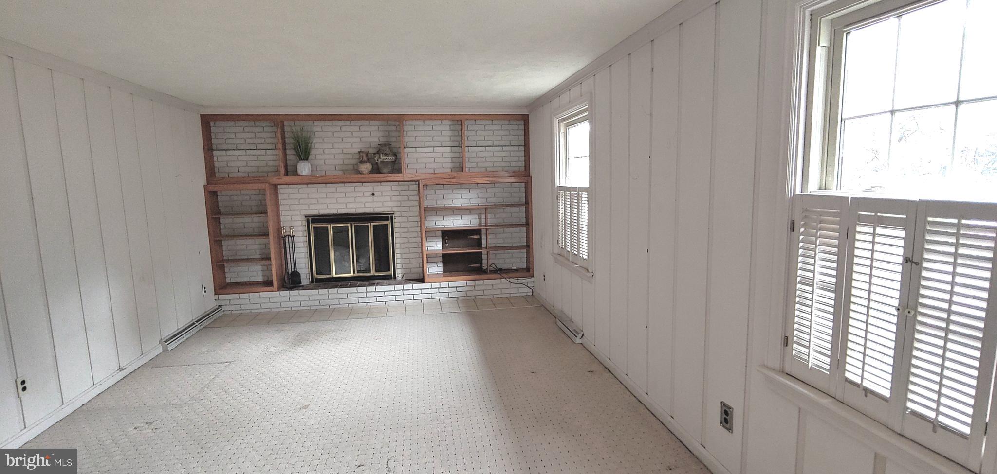 2608 Beechwood Road Lancaster, PA 17601 - Photo 8 of 29 Family Room - Propane fireplace and bookshelves