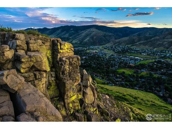 a view of a city with sunset view