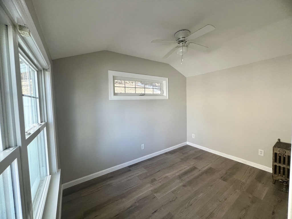 24 Proctor Street Worcester, MA 01606 - Photo 12 of 25 an empty room with a window