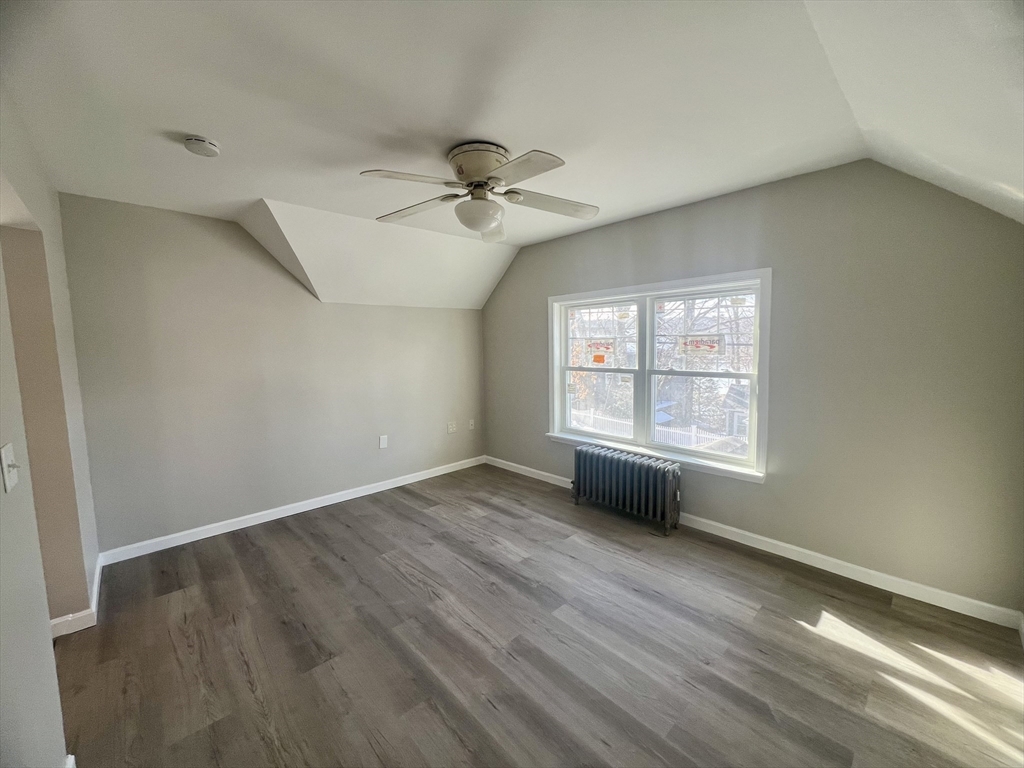 24 Proctor Street Worcester, MA 01606 - Photo 9 of 25 a view of an empty room with a window