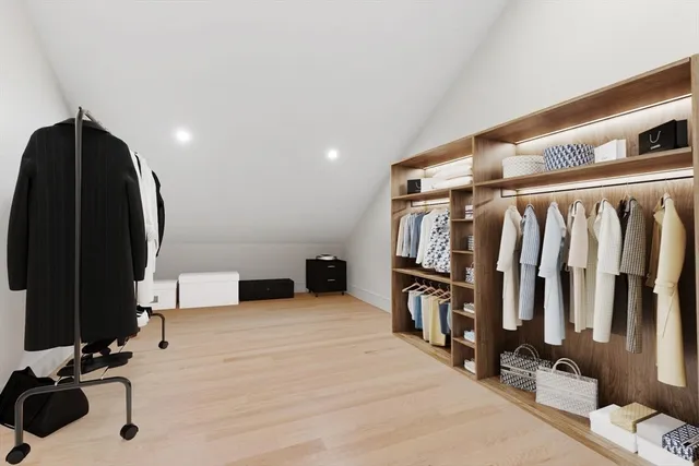 a view of a livingroom with workspace and a couch