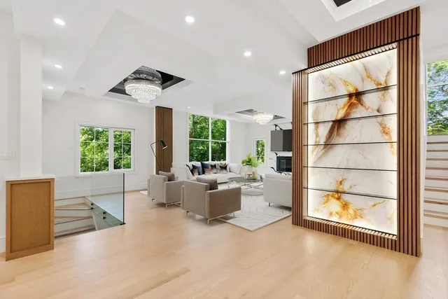 a view of a livingroom with furniture and window
