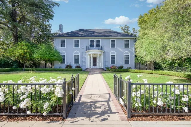 a view of a house with a swimming pool