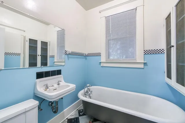 a bathroom with a bathtub
