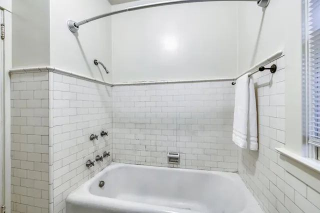 a bathroom with a sink and a tub