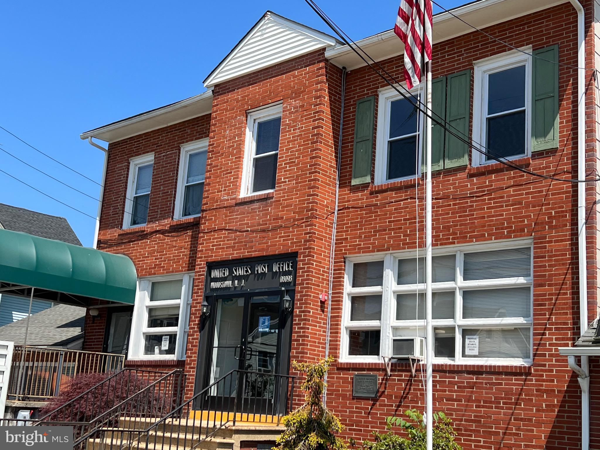 35 East Avenue, Unit 2 Woodstown, NJ 08098 - Photo 9 of 10 a front view of a building with glass windows