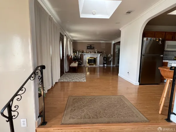 wooden floor with lots of gym equipment
