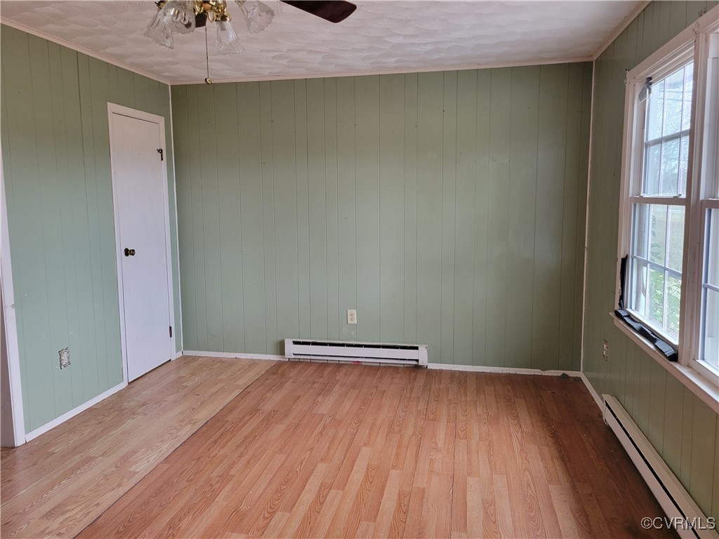 726 Courthouse Drive Saluda, VA 23149 - Photo 3 of 13 Empty room featuring a wealth of natural light, li