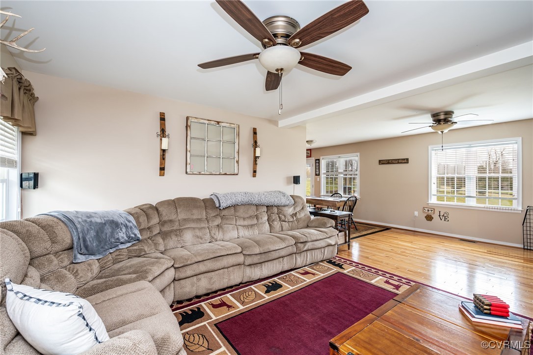 3847 Sage Road Sandy Hook, VA 23153 - Photo 14 of 37 a living room with furniture and a large window