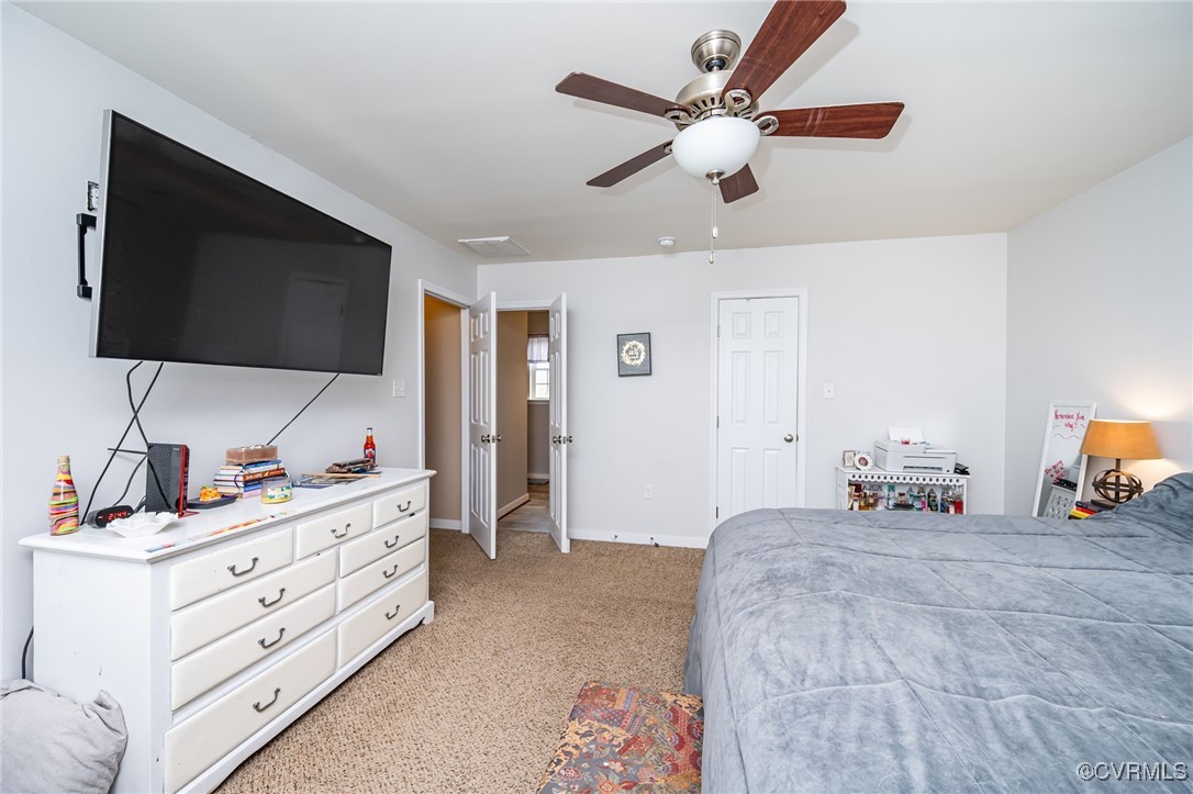 3847 Sage Road Sandy Hook, VA 23153 - Photo 17 of 37 a bedroom with furniture and a flat screen tv