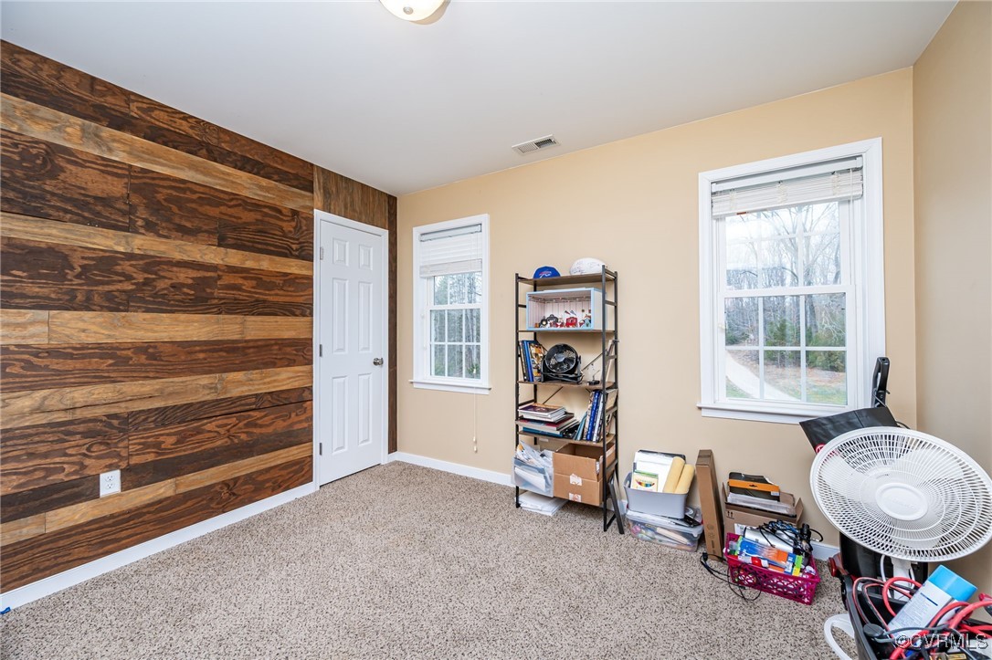 3847 Sage Road Sandy Hook, VA 23153 - Photo 24 of 37 a view of an empty room with toys and a window