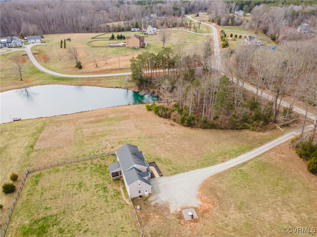 3847 Sage Road Sandy Hook, VA 23153 - Photo 6 of 37 a view of a swimming pool with a yard