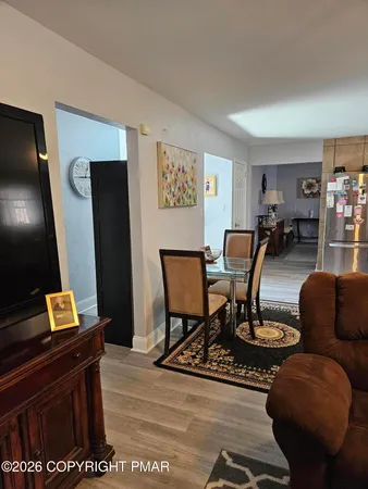a view of a dining room with furniture