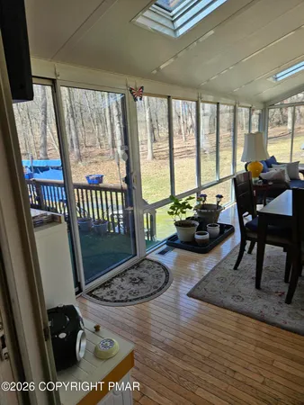 a bedroom with bed and window