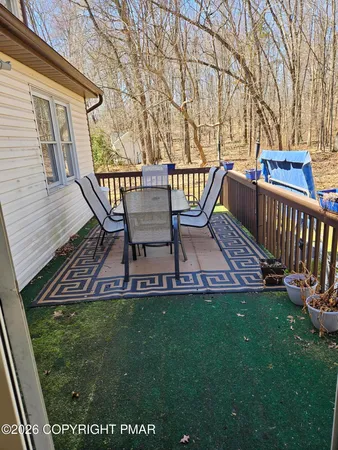 a bathroom with a toilet a sink and a shower