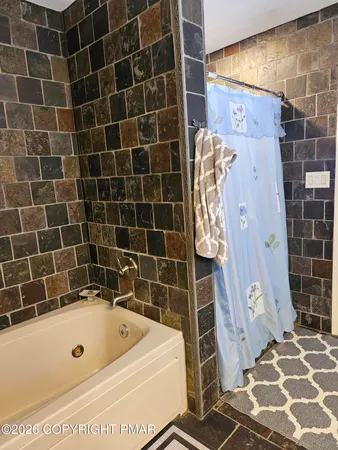 a view of gym equipment and children play room