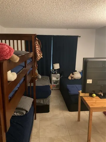 a bathroom with a sink toilet and mirror