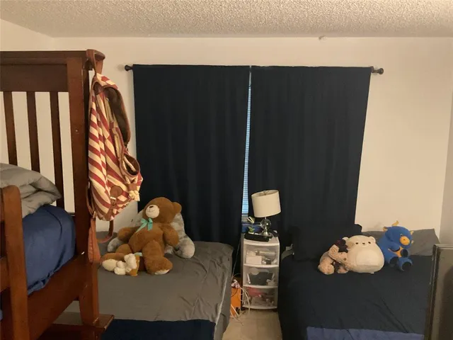 a view of a workspace with furniture