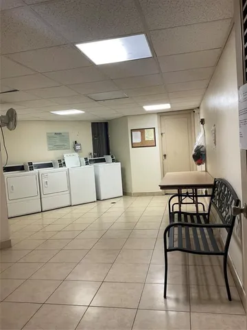 a living room with a couch and a table