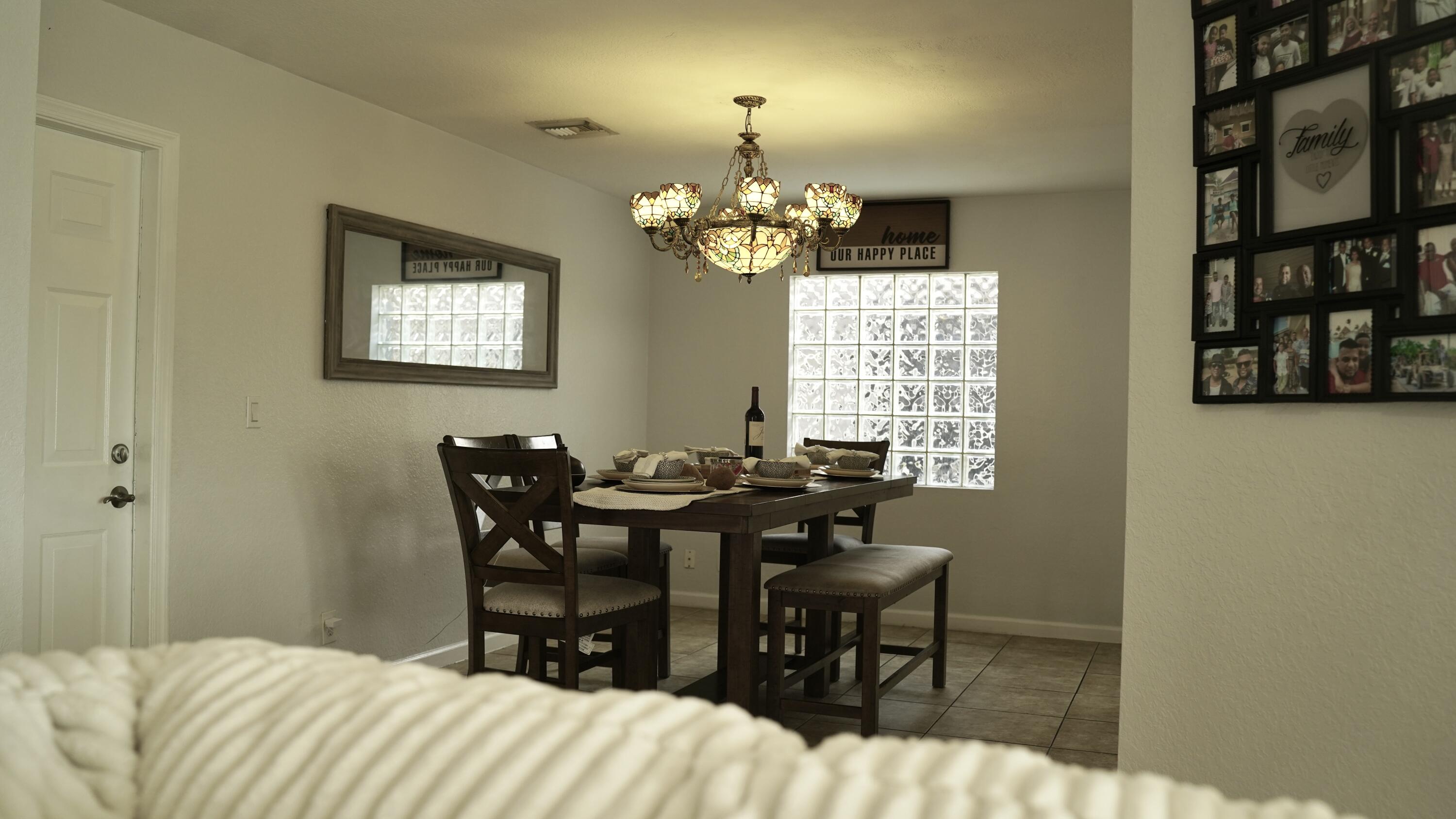 3290 Turtle Cove West Palm Beach, FL 33411 - Photo 14 of 55 a bedroom with a bed and a table