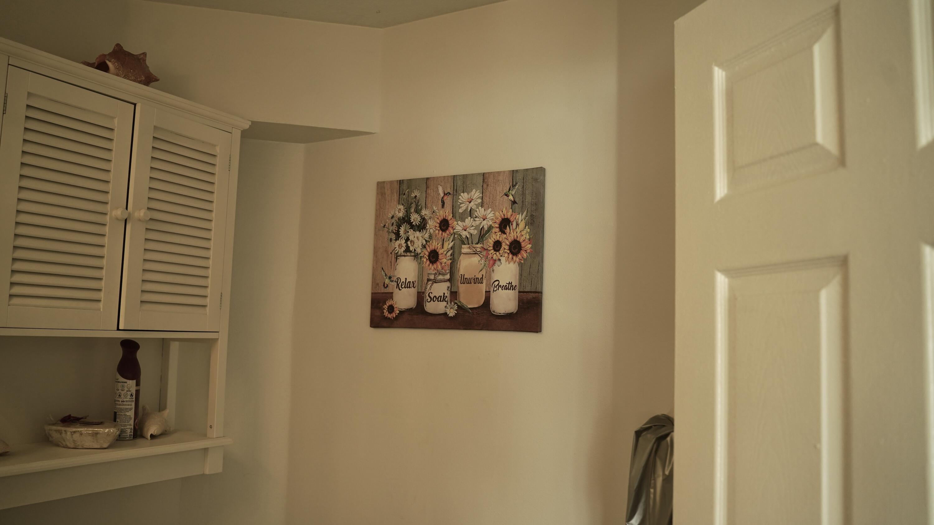 3290 Turtle Cove West Palm Beach, FL 33411 - Photo 23 of 55 a view of a bathroom with a shower and a sink