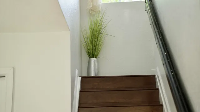 a view of a bathroom from a hallway