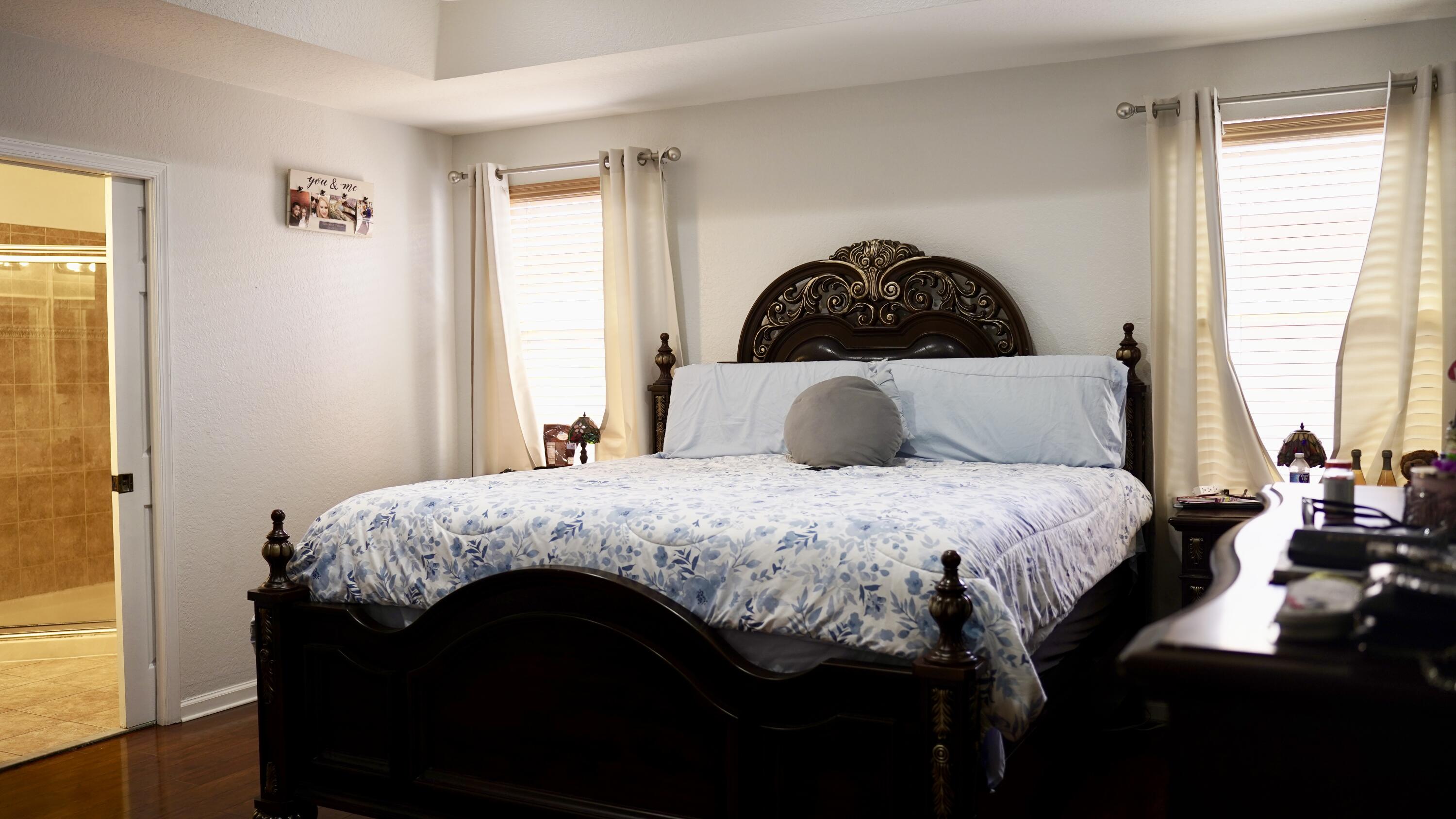 3290 Turtle Cove West Palm Beach, FL 33411 - Photo 28 of 55 a bedroom with a bed and a window