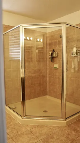 a view of a bathroom from a hallway