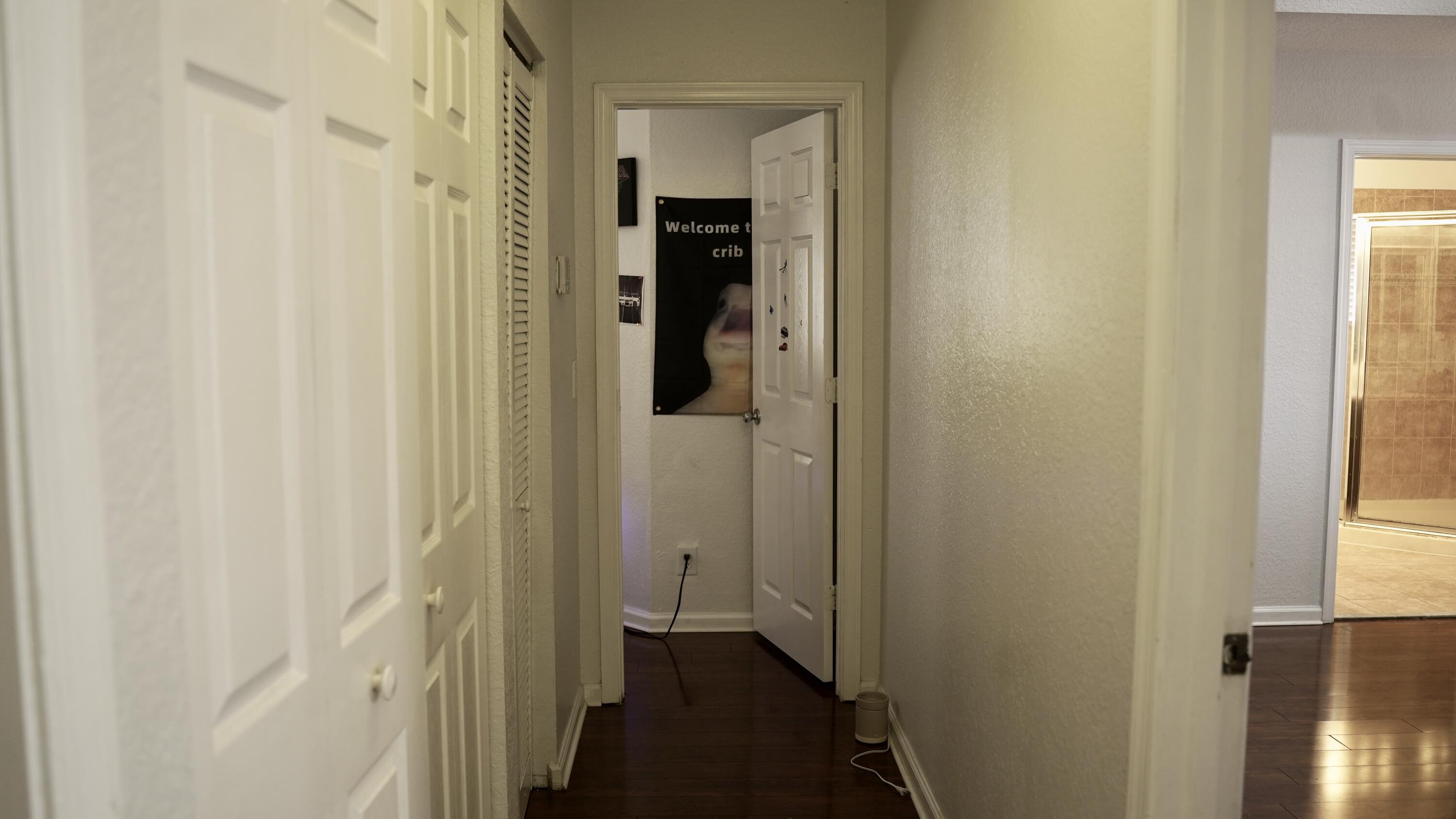 3290 Turtle Cove West Palm Beach, FL 33411 - Photo 34 of 55 a view of a bathroom from a hallway
