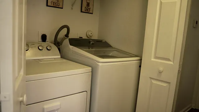 a view of a bedroom with a bed