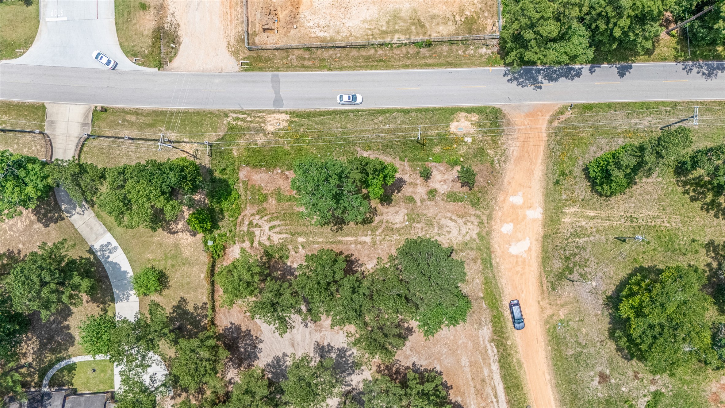 13907 Willis Waukegan Road Conroe, TX 77303 - Photo 14 of 18 a view of a lake from a building