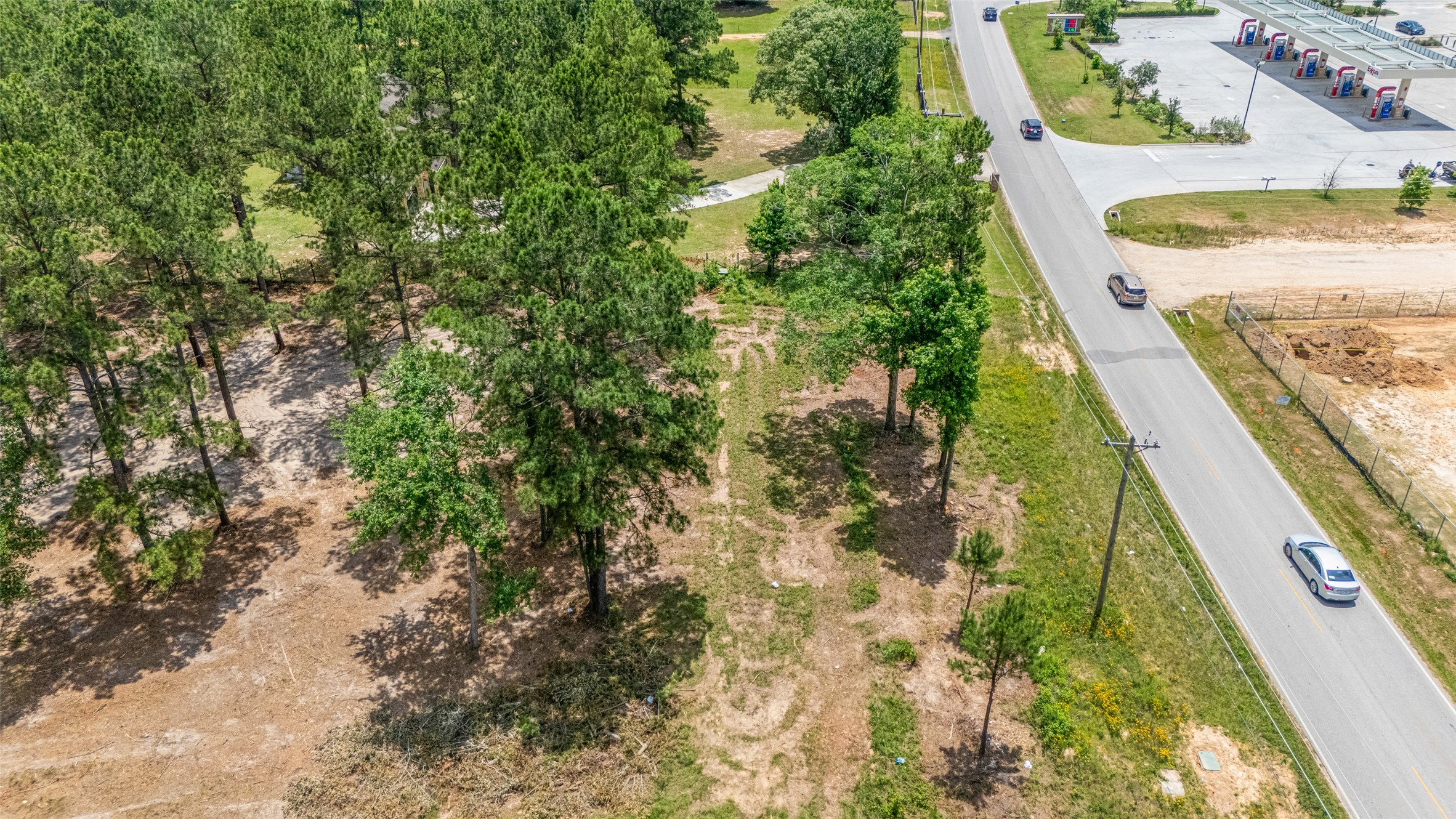 13907 Willis Waukegan Road Conroe, TX 77303 - Photo 5 of 18 a view of balcony with wooden floor