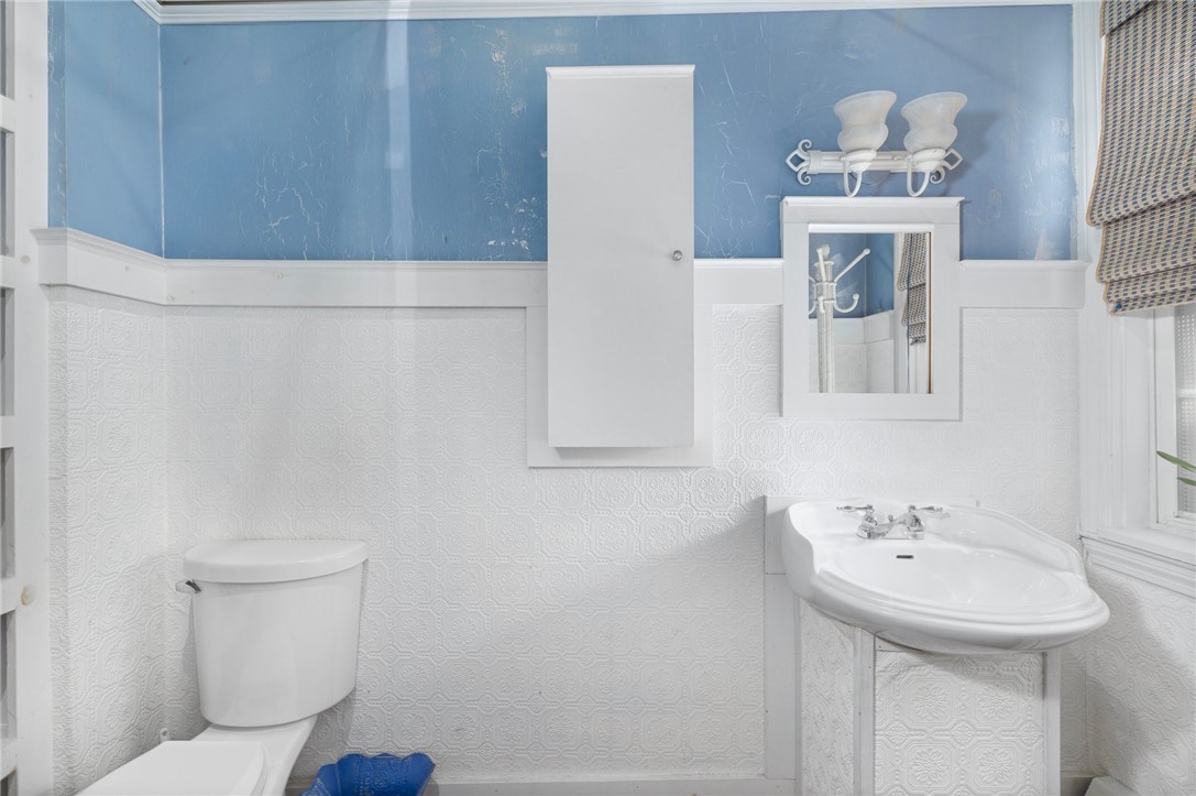 786 Sandy Lane Warwick, RI 02889 - Photo 11 of 26 A downstairs, half bath for convenience.