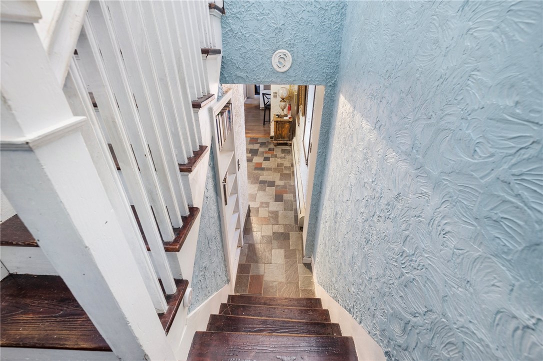 786 Sandy Lane Warwick, RI 02889 - Photo 13 of 26 Hardwood treads and risers lead you upstairs.
