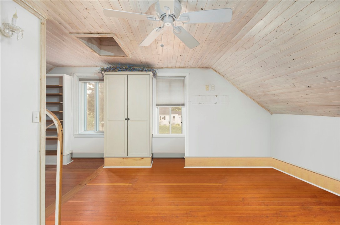786 Sandy Lane Warwick, RI 02889 - Photo 14 of 26 One of two, upstairs bedrooms. This room offers hardwood floors, built ins and a large, walk in closet.