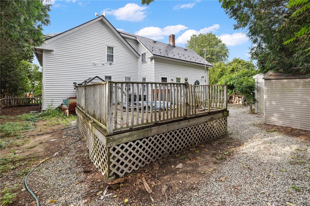 786 Sandy Lane Warwick, RI 02889 - Photo 22 of 26 The rear deck needs work but has a strong foundation.