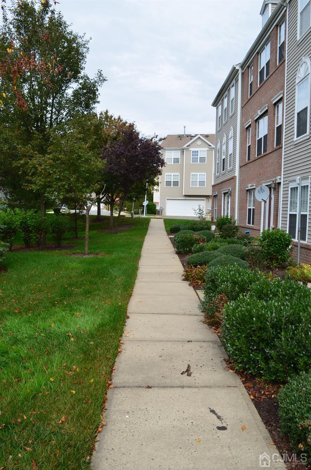 37 Rojewski Way, Unit 1471 Sayreville, NJ 08859 - Photo 4 of 28 a view of backyard with green space