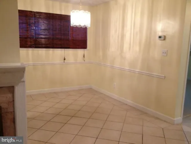 a kitchen with a stove and a sink