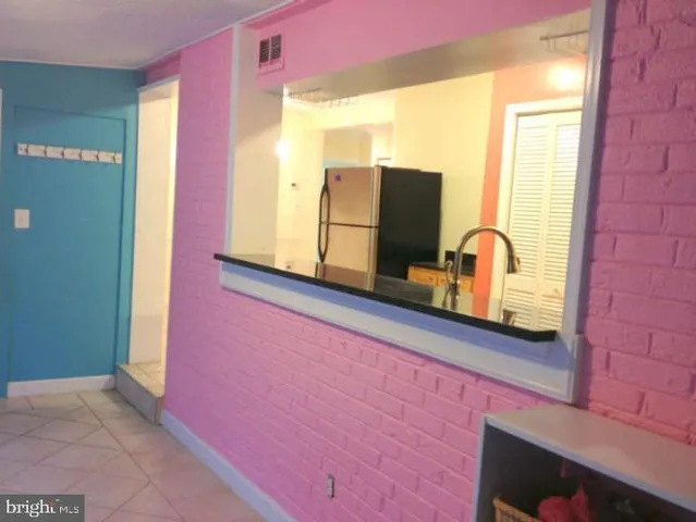 a view of livingroom with furniture and windows