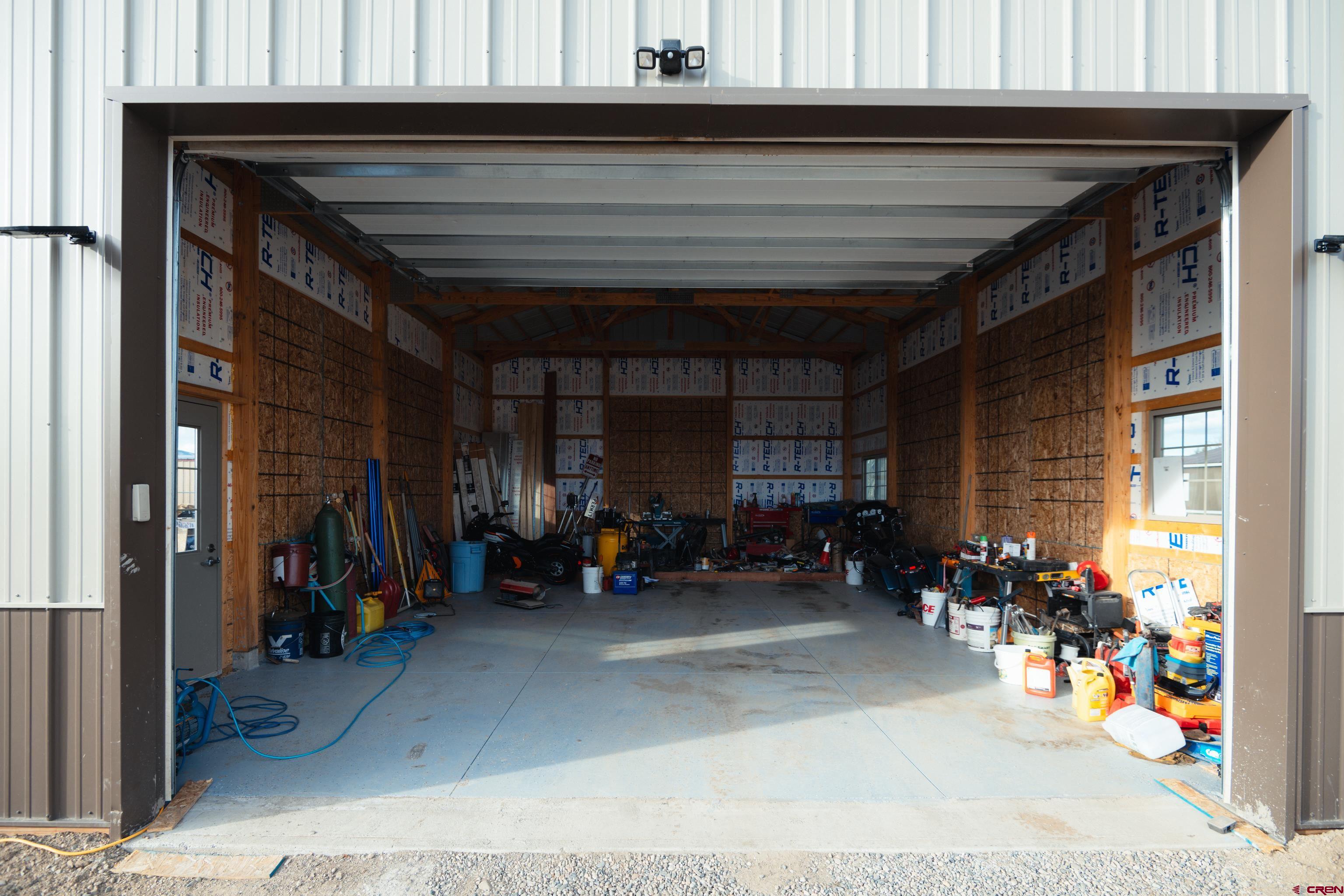 300 West Rio Grande Avenue Gunnison, CO 81230 - Photo 17 of 23 a view of a storage room with a lot of stuff
