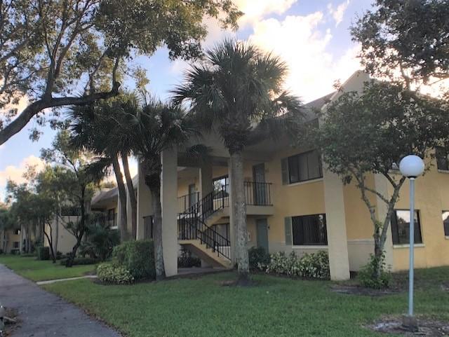 420 Meadows Circle Boynton Beach, FL 33436 - Photo 1 of 12 1-Building front view