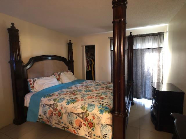 420 Meadows Circle Boynton Beach, FL 33436 - Photo 8 of 12 8-2nd bedroom