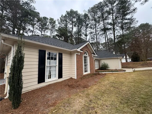 a room with furniture and a window