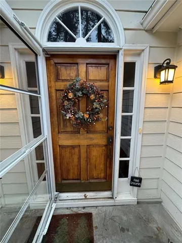 a kitchen with granite countertop cabinets and steel stainless steel appliances
