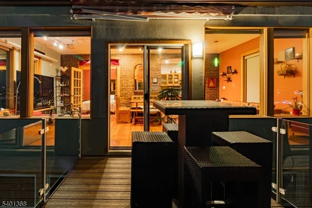 a view of a living room with a large window